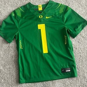 Oregon jersey size YL. Never worn